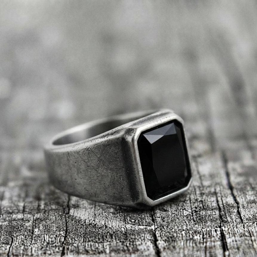 Signet Ring with Black Gemstone and Engraved Symbol
