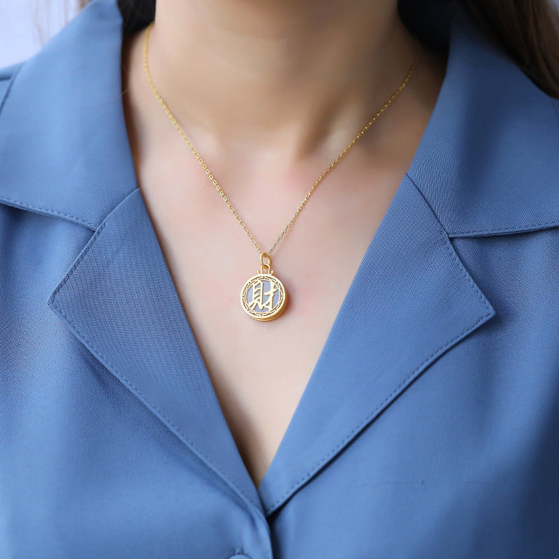 Delicate Artisan Gold Pendant