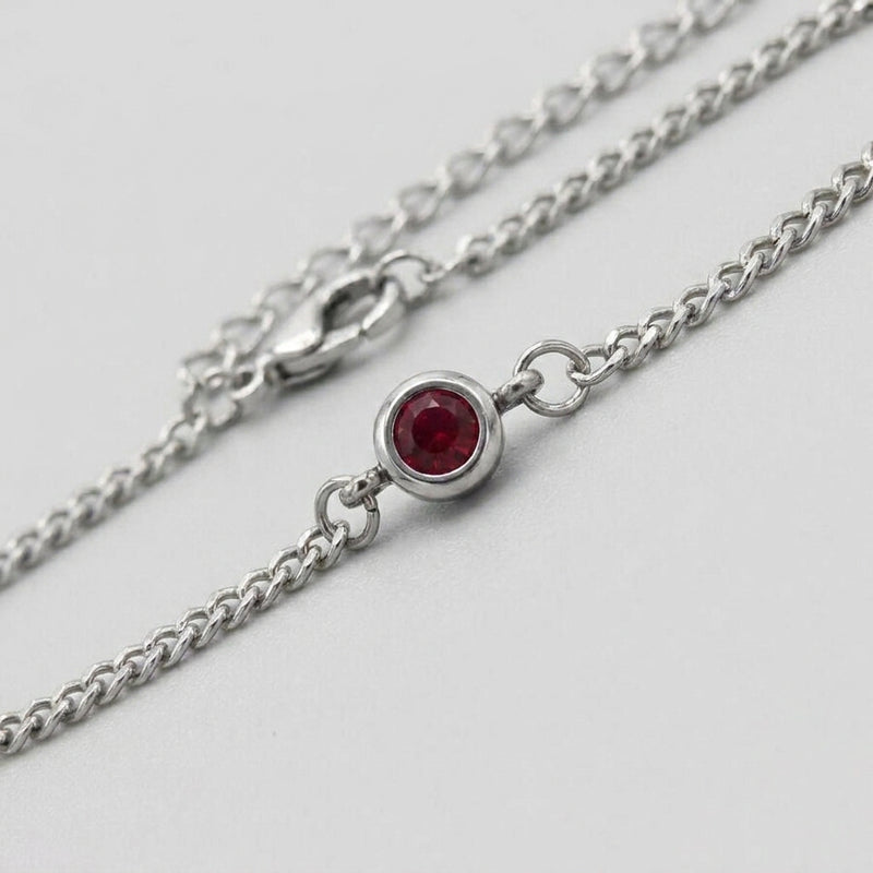 Ruby Solitaire Silver Curb Chain Bracelet