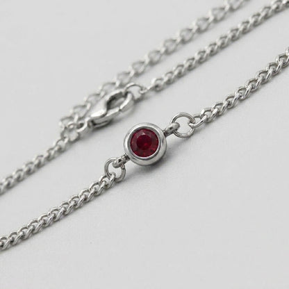 Ruby Solitaire Silver Curb Chain Bracelet