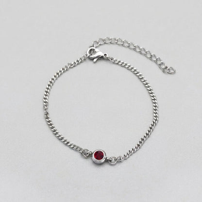 Ruby Solitaire Silver Curb Chain Bracelet