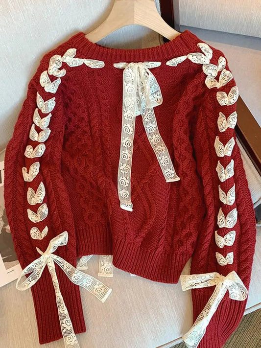 Julia® | Warm knitted sweater with lace threads and bow for women