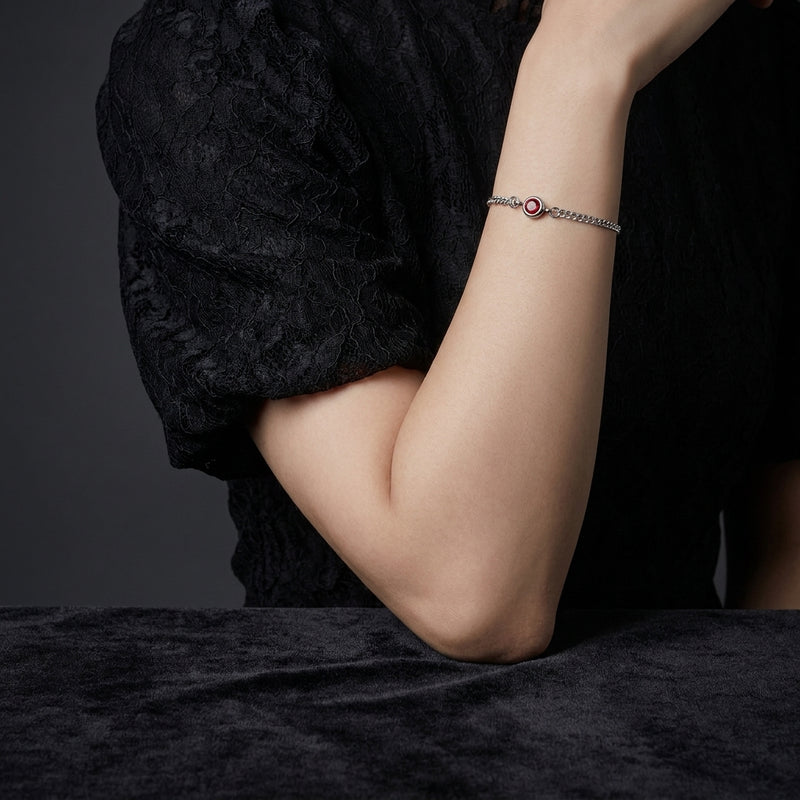 Ruby Solitaire Silver Curb Chain Bracelet