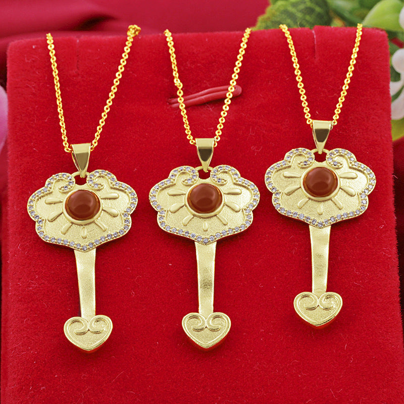 Delicate Artisan Gold Pendant