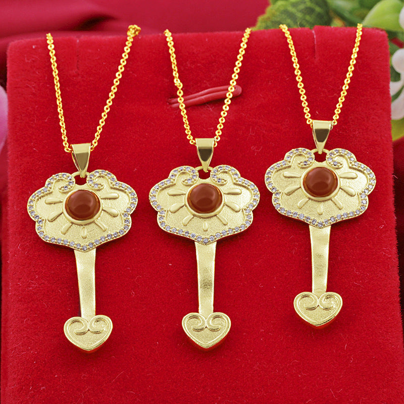 Delicate Artisan Gold Pendant