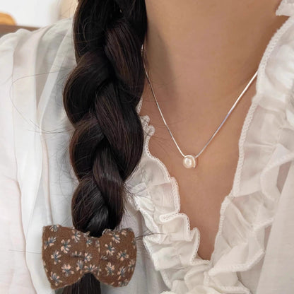 Delicate Artisan Pearl Necklace