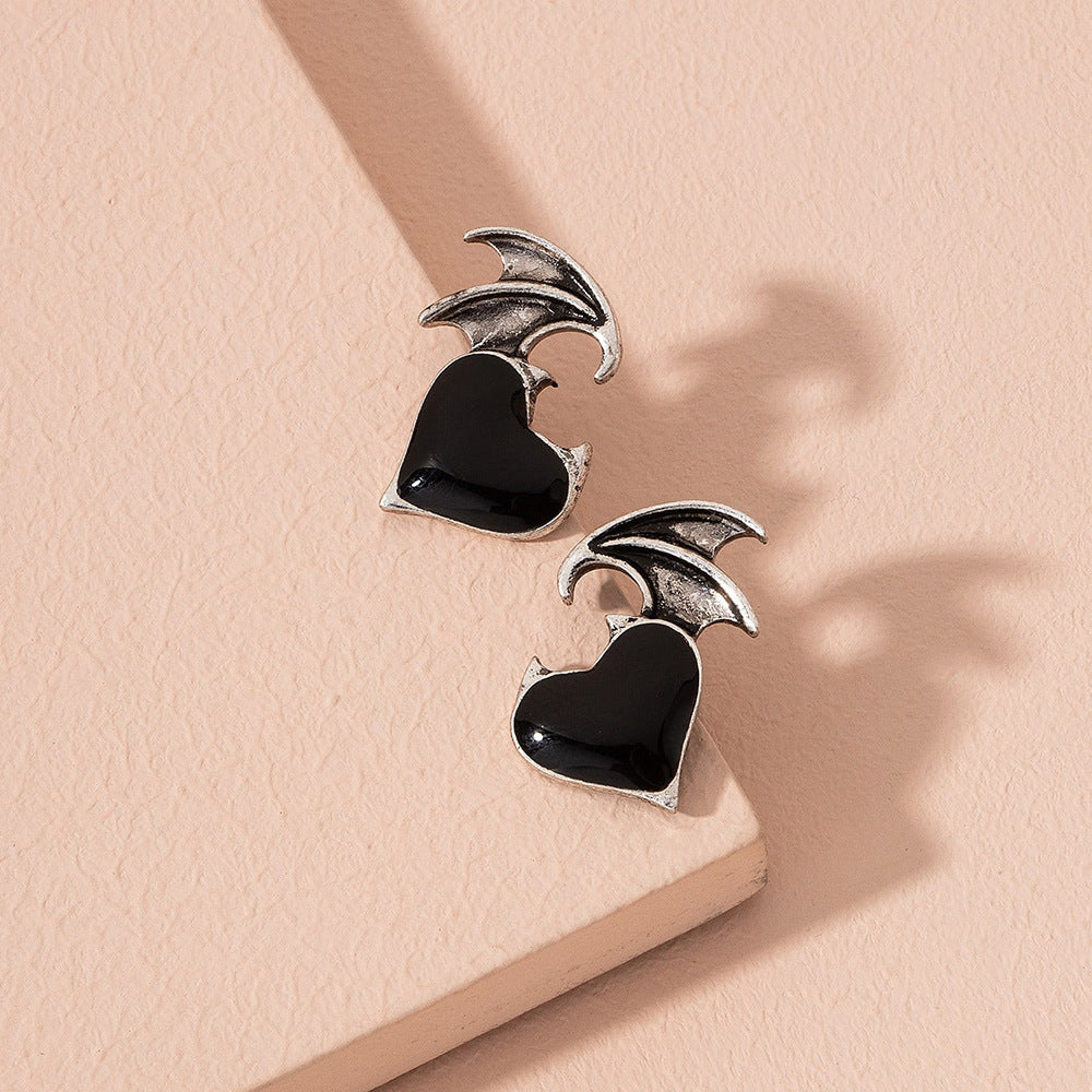 Dark Heart Takes Flight - Black Enamel Winged Heart Stud Earrings