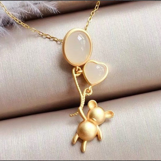 Delicate Artisan Gold Pendant