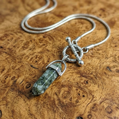 Serpentine Cipher Crystal Point Necklace