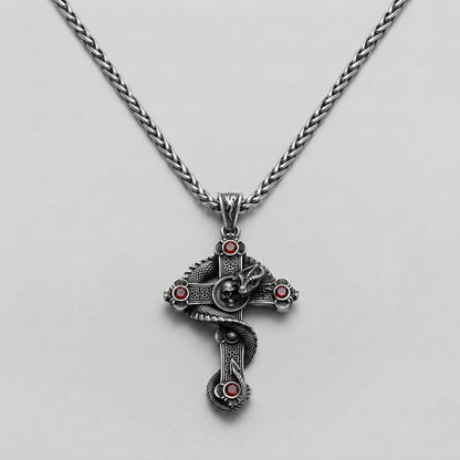 Snake and Skull Cross Necklace with Red Gemstones
