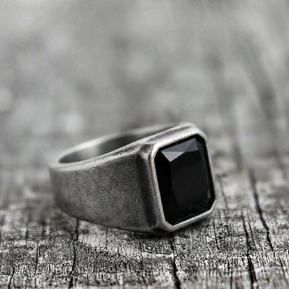 Signet Ring with Black Gemstone and Engraved Symbol